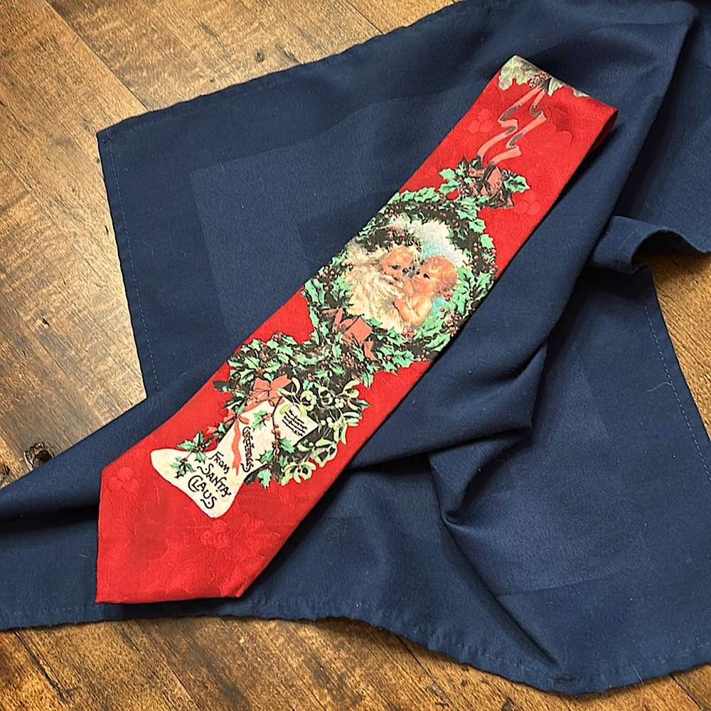 A Christmas tie from DILLARDS  100 percent silk and made in USA